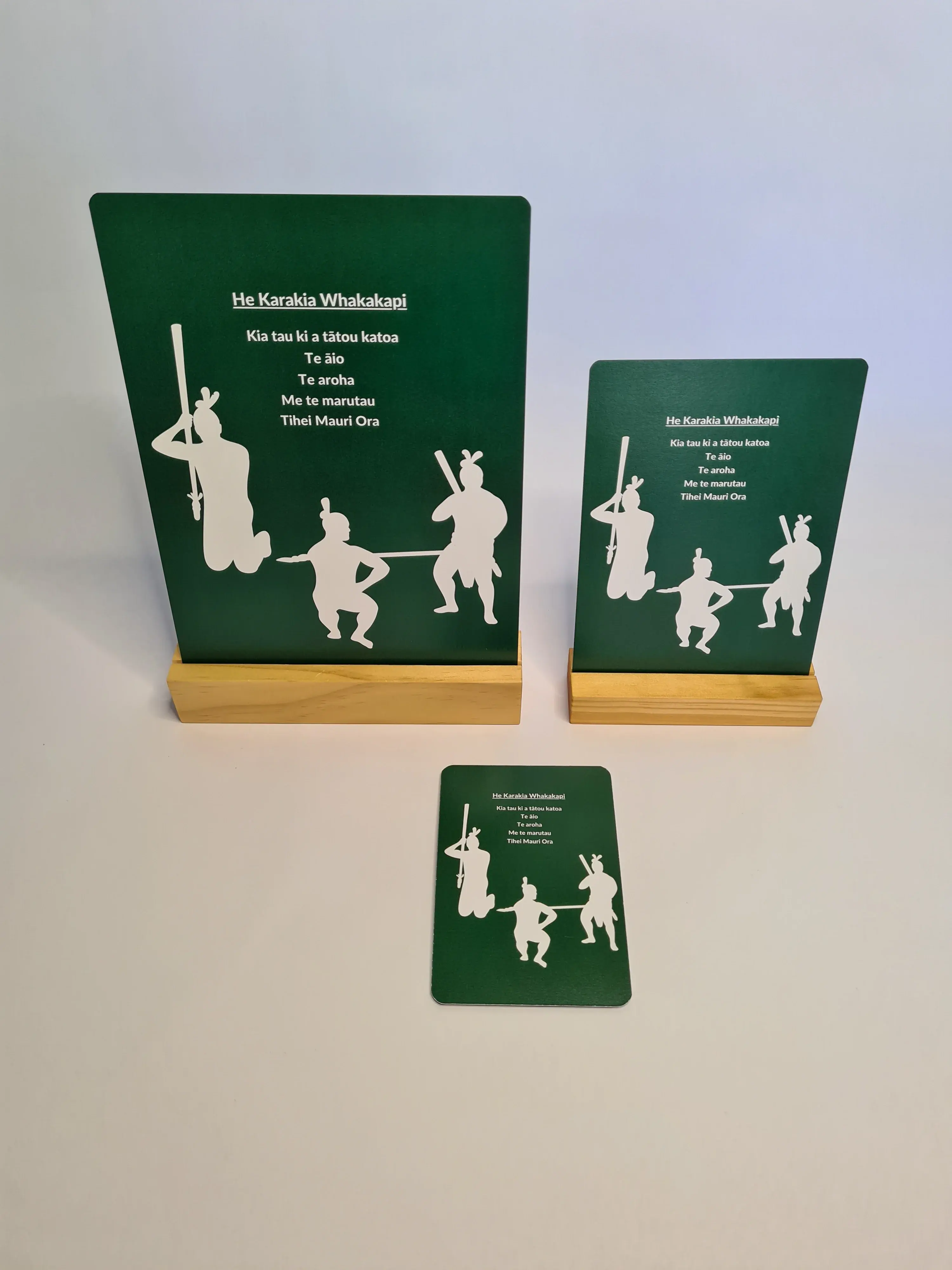 Māori card set on wodden card stands